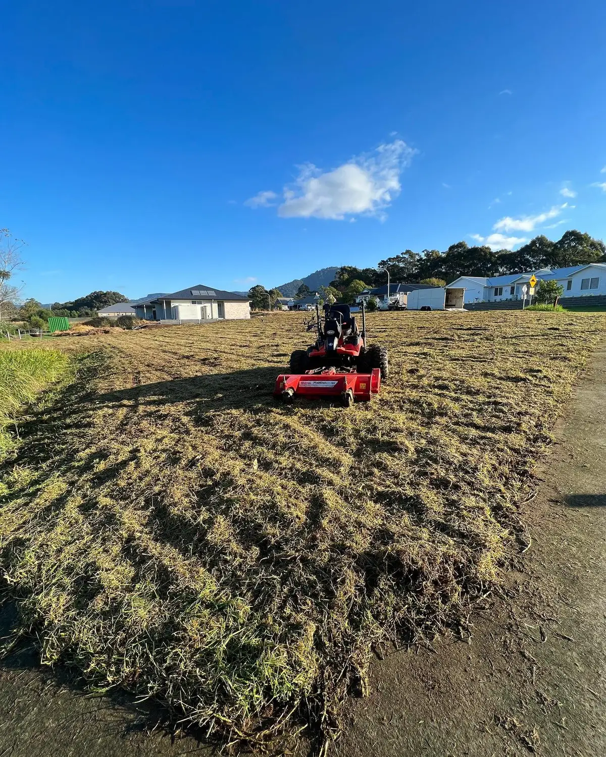 The same vacant block freshly mowed and tidy after Broadlands Contracting visited