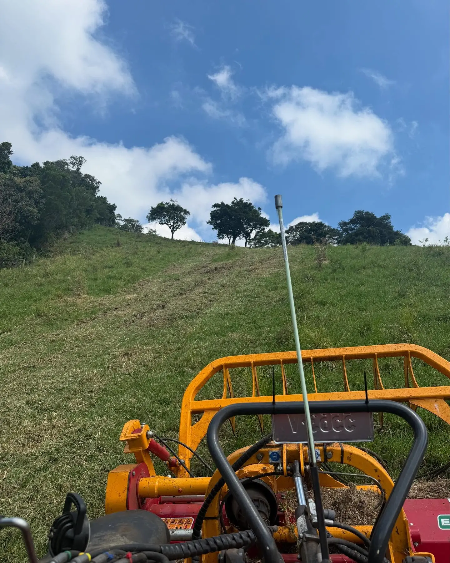 View from a Broadlands Contracting slasher working up a steep green paddock