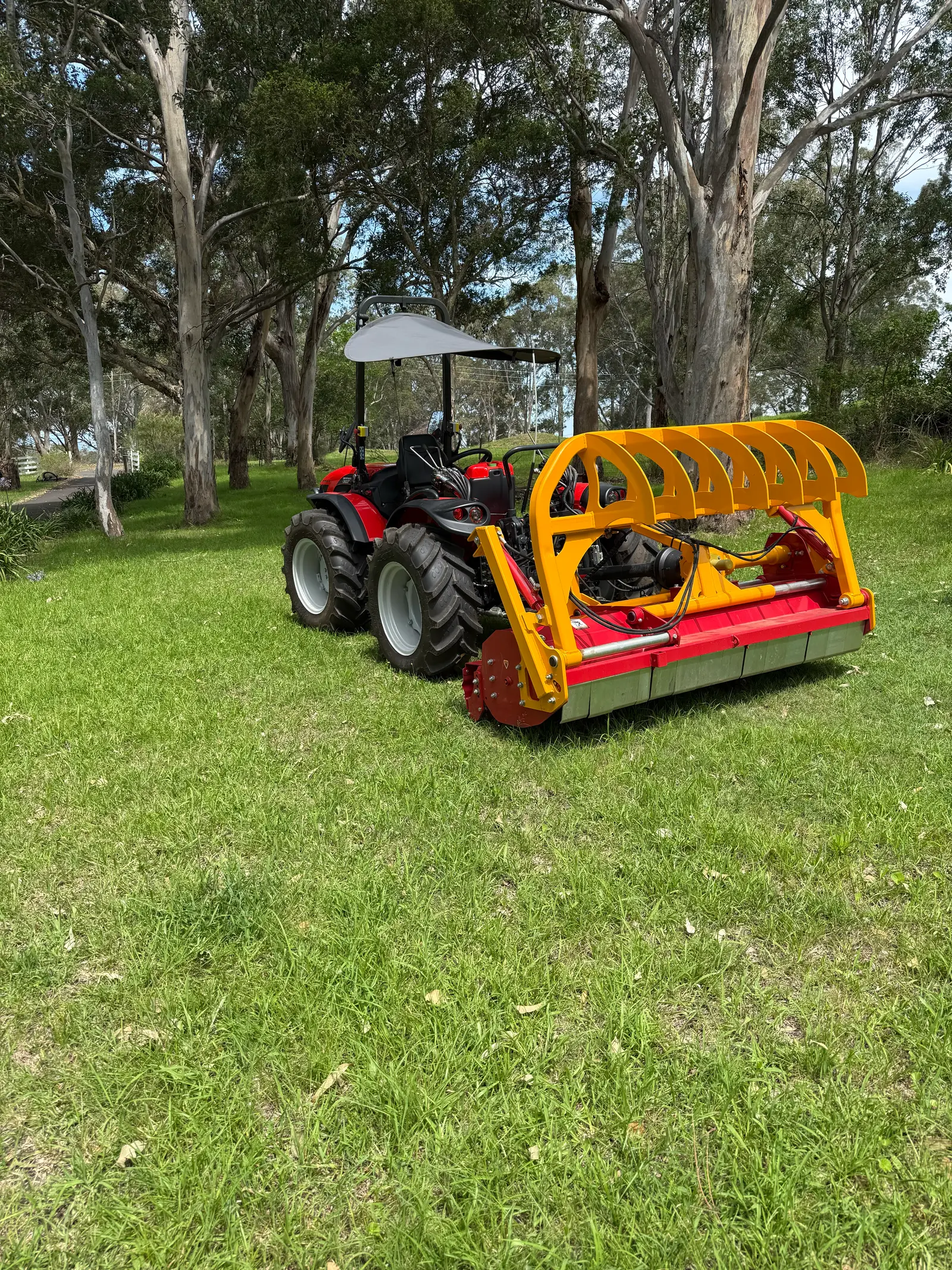 Broadlands Contracting tractor with mulching deck ready for slashing work